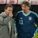 bundestrainer-julian-nagelsmann-ger-mit-nick-woltemade-ger-vor-einwechslung-fussball-laenderspiel-sc.webp